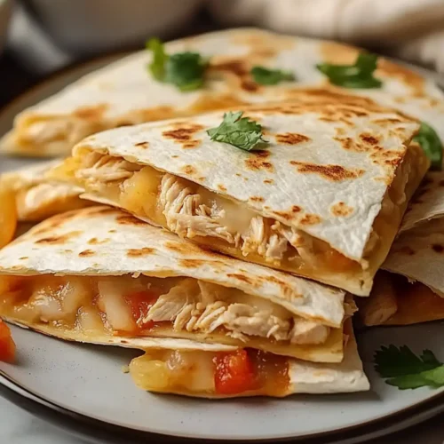 Mexican Crockpot Chicken Quesadillas